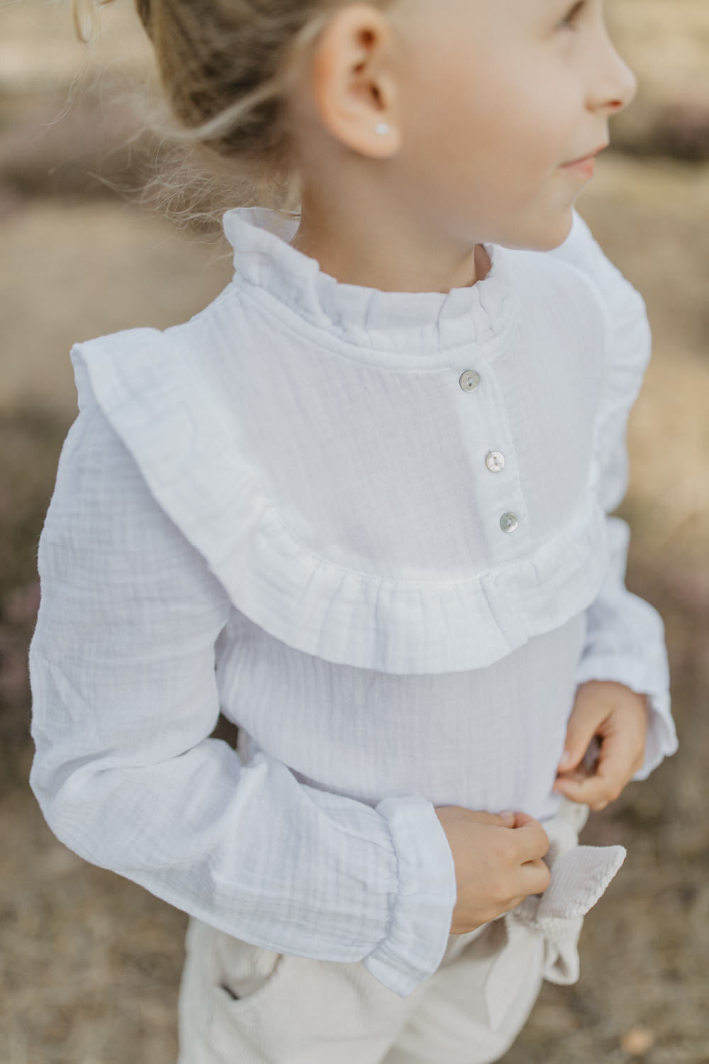 Schlupfbluse mit Rüschendetails weiß-86-92